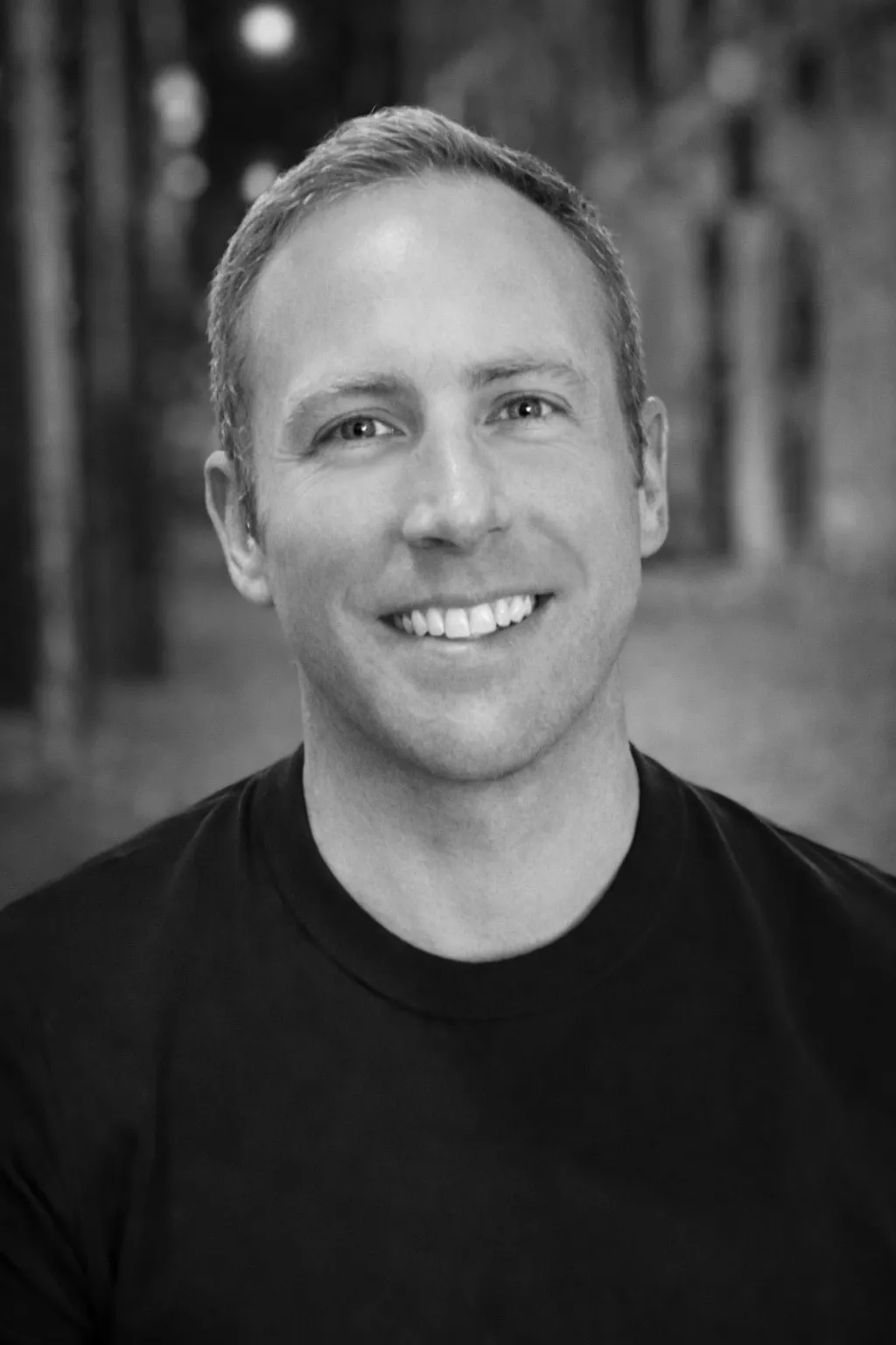 Black-and-white portrait of Ryan Jameson.